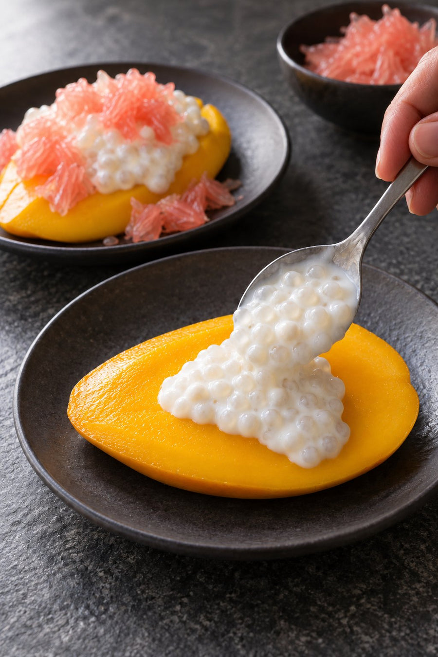 Solid Mango Pomelo Sago with Strained Yogurt, step 7: Build the mango boats